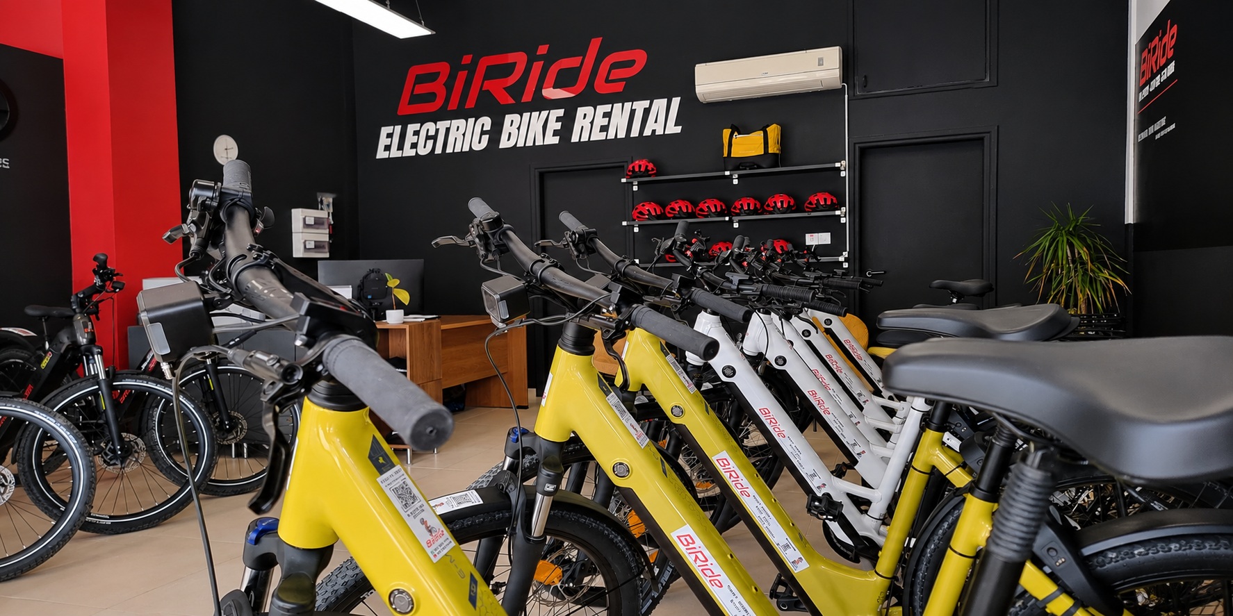 BiRide electric bike showroom in Paphos with helmets and prepared rental bikes